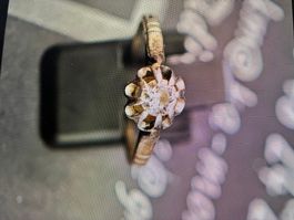 BAGUE EN ARGENT 800    SERTIE  D'UN DIAMANT   DE 0,20 CARAT.