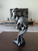 Magnifique sculpture couple en résine