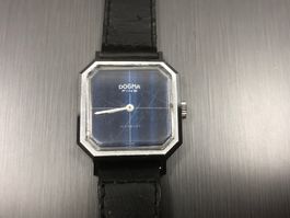 Dogma Fine , Damenuhr, Handaufzug  Die Uhr läuft gut