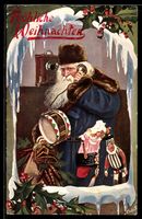 Weihnachtsmann mit Geschenken am Telefon