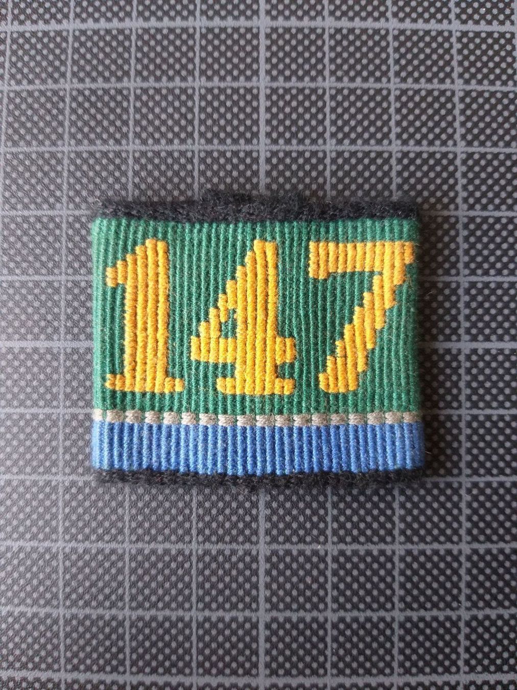 Plaketten & Abzeichen: Achselschlaufe Infanterie Bat 147 Kp 4 – Gebraucht aus Bauma von SwissMilitaria