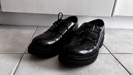 Black fake leather shoes