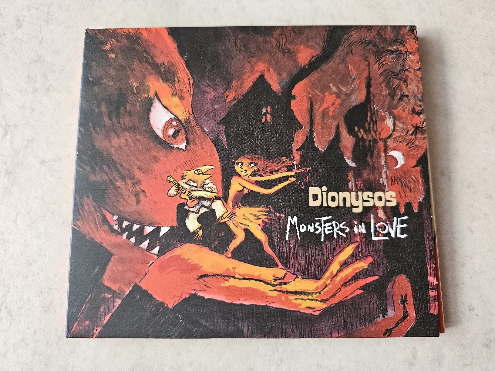 CDs: Dionysos  -  Monster's In Love  /  CD & DVD – D'occasion à Schneisingen par backstore24
