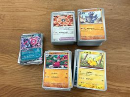 2 Tins gefüllt mit Japanischen Pokemonkarten