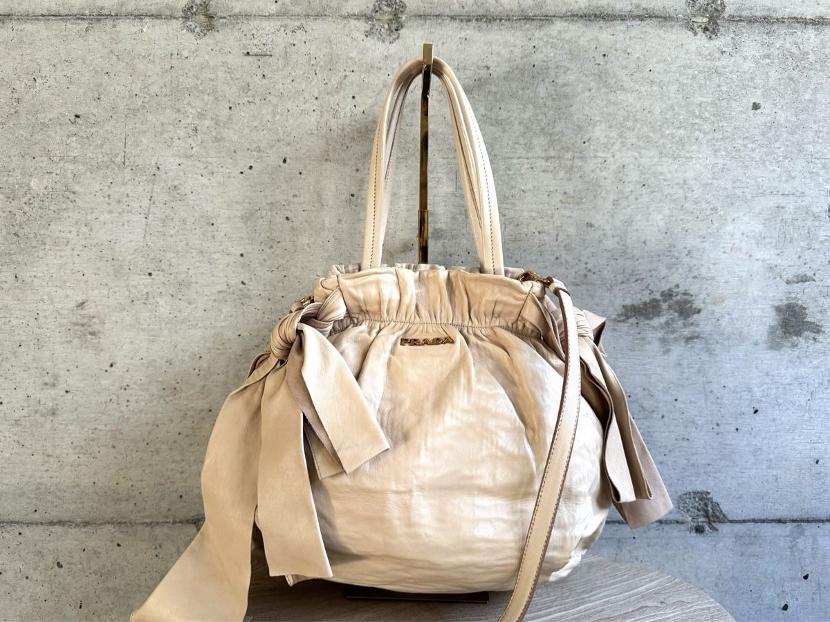 Prada Borse da donna: PRADA Nappa Bow Tote Sac Tasche – Usato da Kriens venduto da hannaandkiko