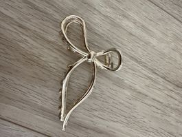 Elegante Metall-Haarklammer mit Schleife, goldfarben
