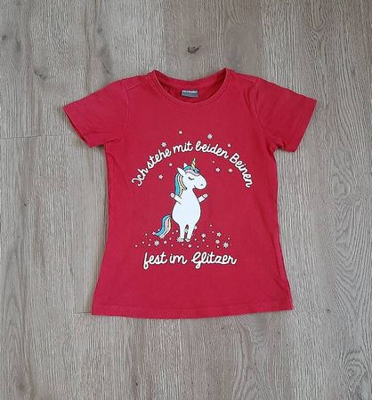 Herziges T-Shirt mit Einhorn-Aufdruck rot Gr. 116/122