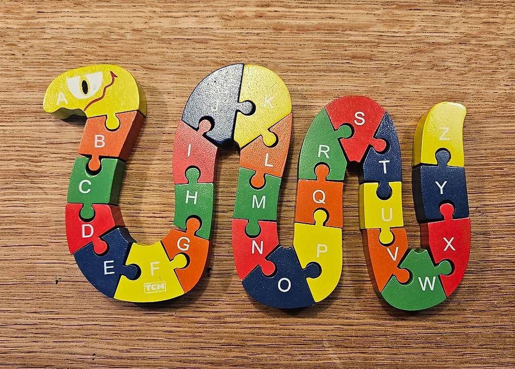 Puzzles: Puzzle en bois serpent alphabet et chiffres – Gebraucht aus Renens VD von arochat 1