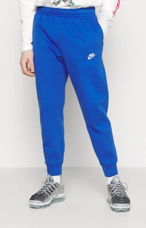 84. Pantalon de jogging Nike bleu taille S avec petit défaut