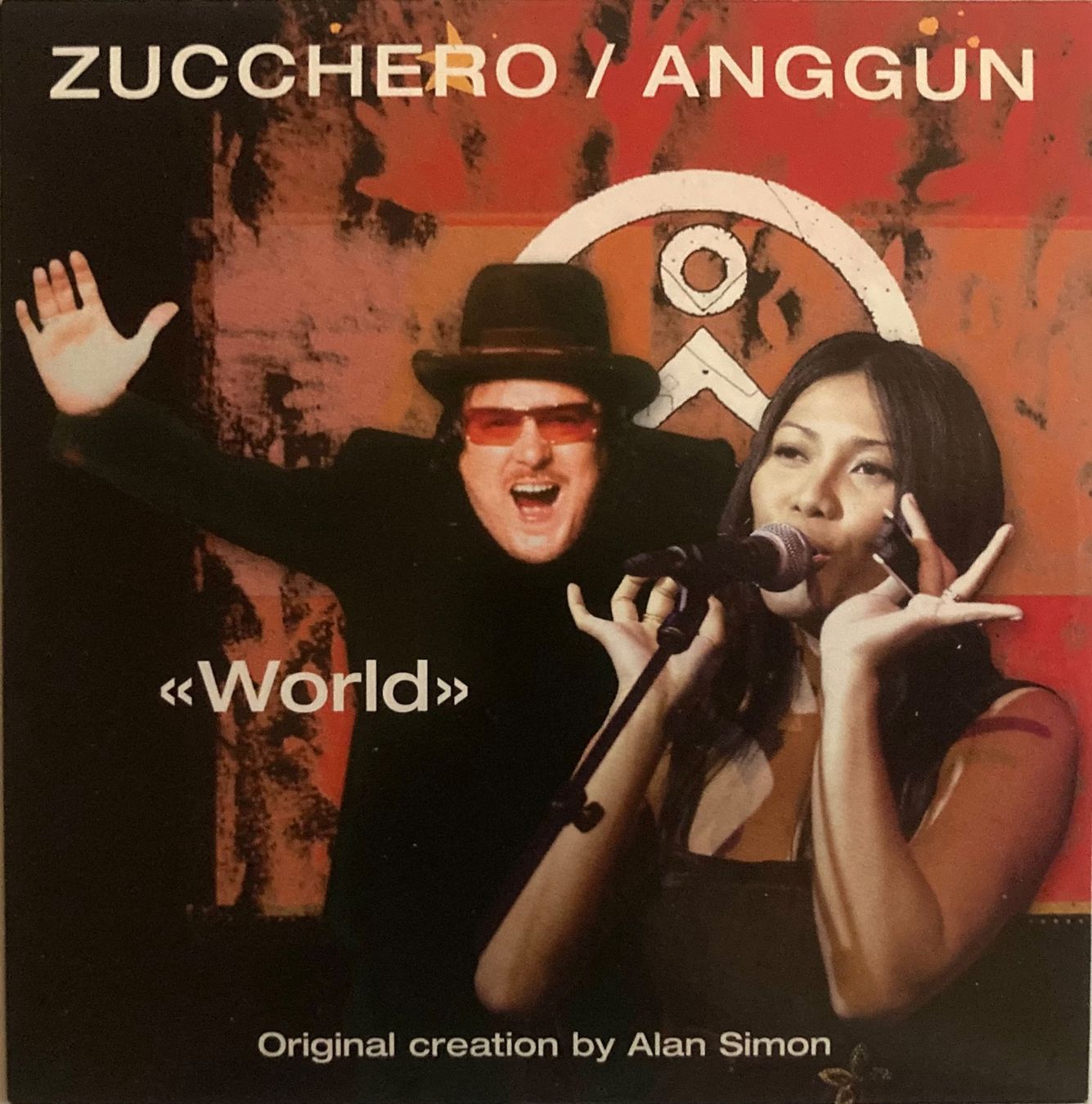 CD: ZUCCHERO / ANGGUN - WORLD – Usato da Poliez-Pittet venduto da Newtown-Records