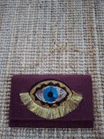 Sac bordeau à paillettes Œil