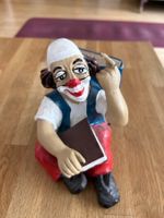 Lustiger Clown als Buchstütze, Dekofigur