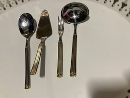 Besteck Set Silber und Gold