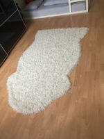 Flauschiger Teppich in Fellform