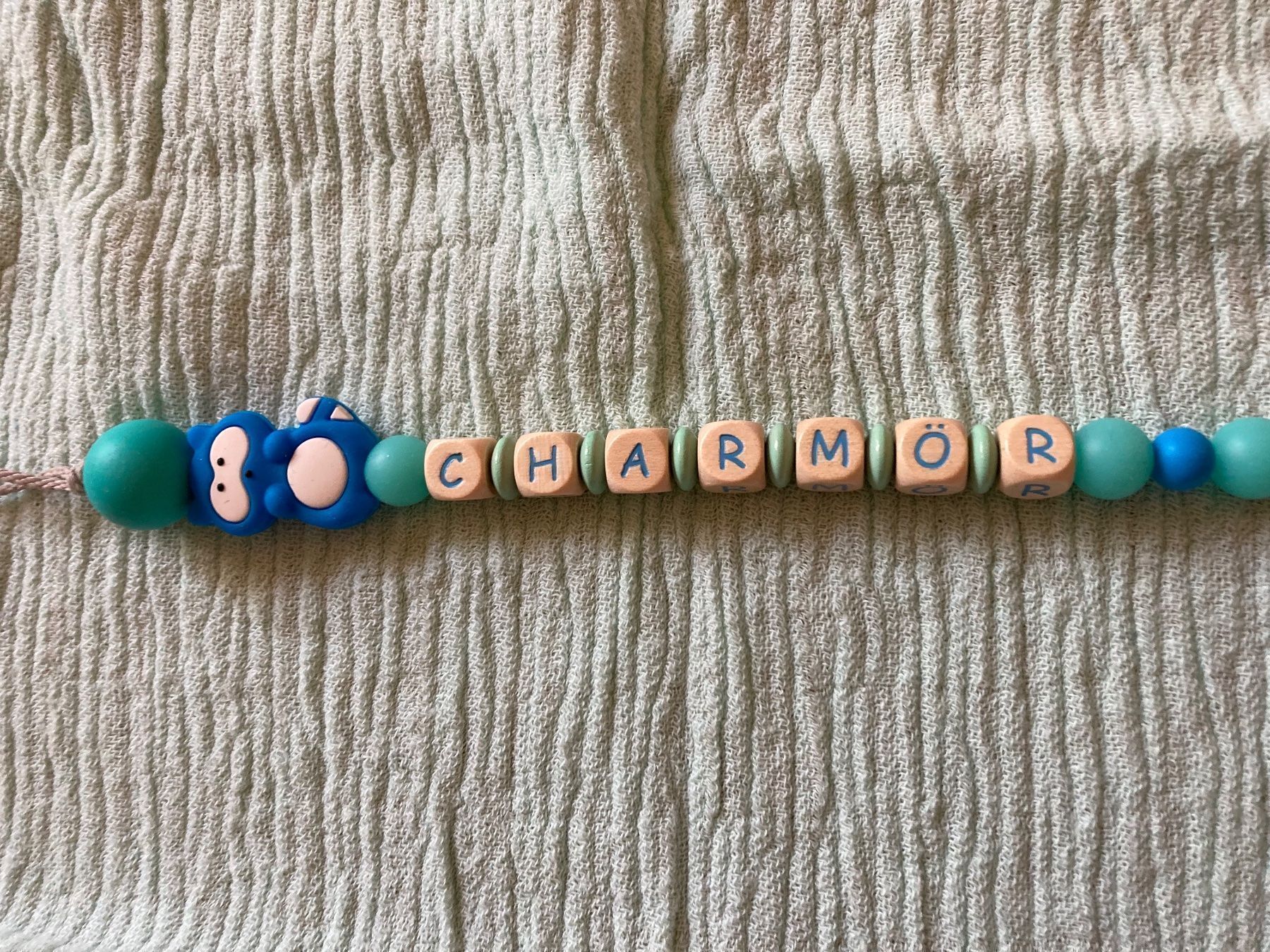 Succhiotti & catenelle porta ciuccio: Nuggikette CHARMÖR blau, Neu – Nuovo e nell'imballaggio originale da Emmenbrücke venduto da JJ_89 1