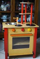 Kinderküche aus Holz mit viel Zubehör