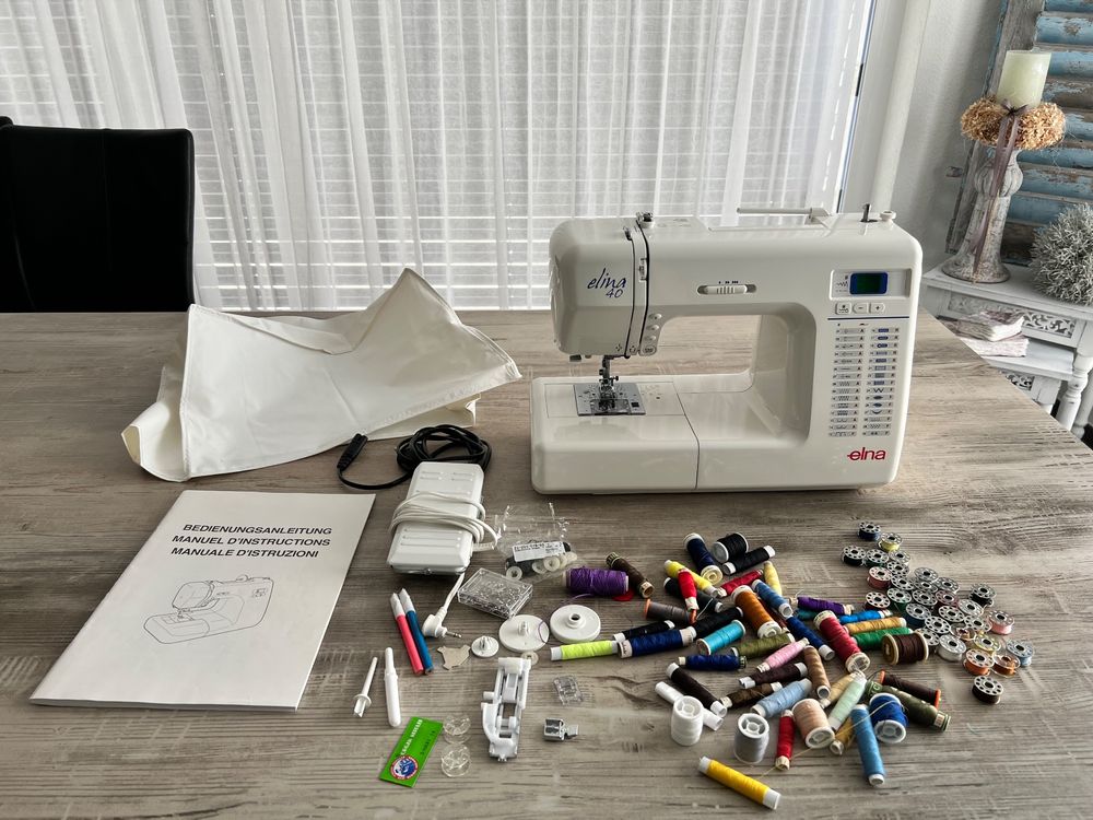 Nähmaschine Elna / Elina 40 mit diversen Spulen und Faden Kaufen auf