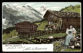 AK Mürren, Die Alphütten, Frau in Tracht