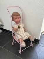 Alte antike Puppe mit Wagen, Sammlerstück, Rarität
