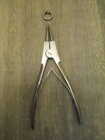 Piercing plus Zange