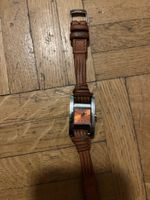 Montre femme bracelet cuir état correct