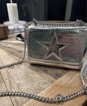 Handtasche silberfarben mit Stern Motiv neuwertig