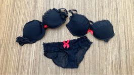 Schwarzer BH und Slip mit Schleife 