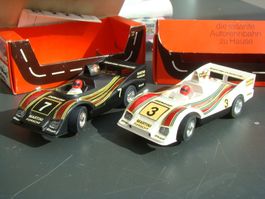 2 Märklin mit Box  Porsche 962 weiss und schwarz topselten