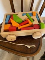 Holzspielzeug Wagen mit Bauklötzen