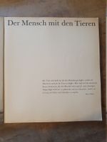 Der Mensch mit den Tieren - Deutsch