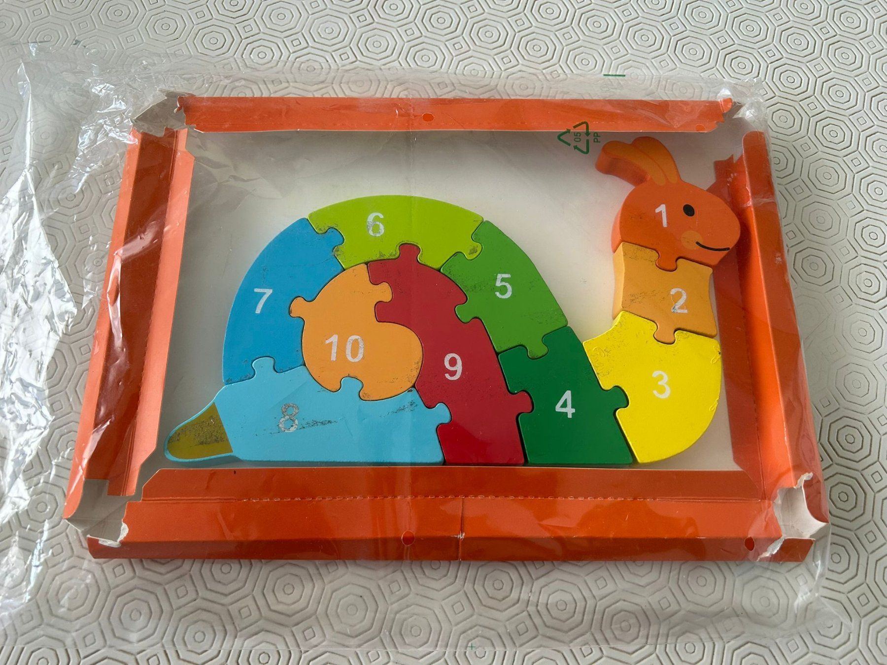 Puzzle: Puzzle legno 10 pezzi lumaca colorata – Usato da Melano venduto da H-Sara