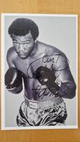George Foreman, Originalautogramm auf Foto in s/w