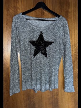 Pull gris chiné étoile noire