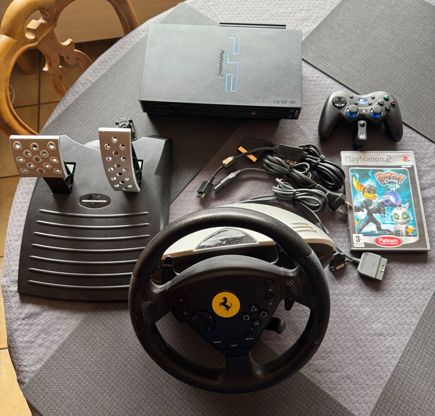 Sony Console: PS2 Fat + Network Adapter + volant Ferrari Thrustmaster – Usato da L'Orient venduto da dav_8slp
