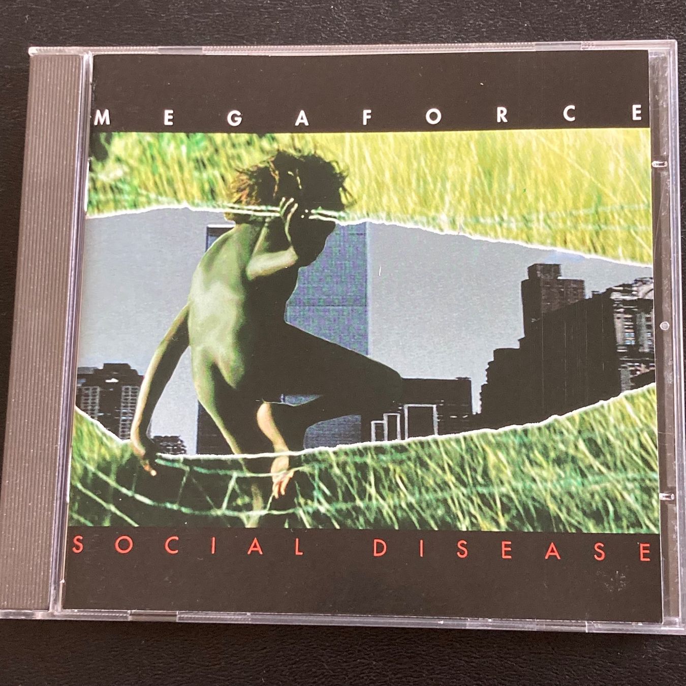 CD: Megaforce - Social Disease | Swiss Hard Rock – Usato da Bern venduto da Ntsamina