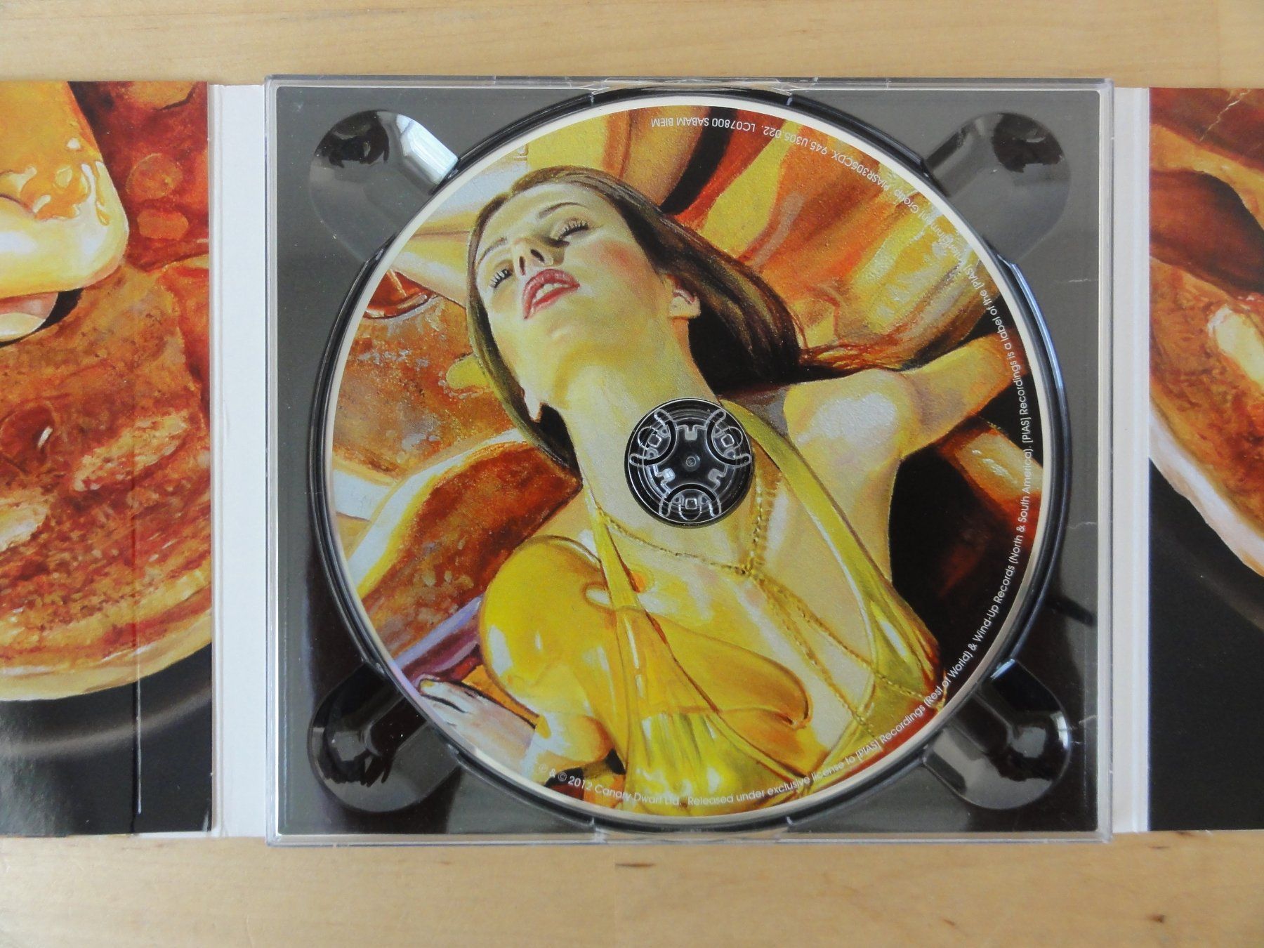 CDs: THE DARKNESS "Hot Cakes" – D'occasion à zürich par Goldimmund 5