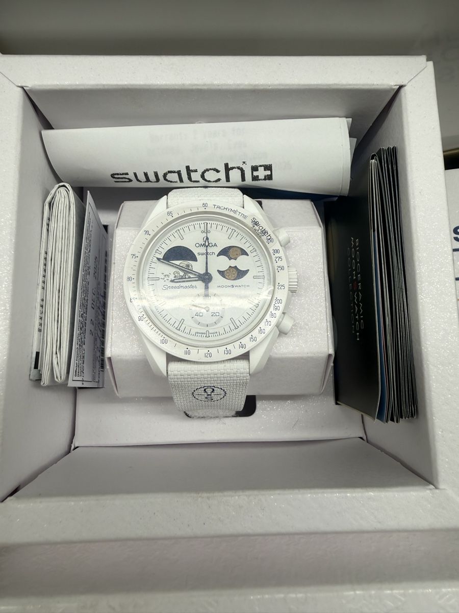 Swatch Omega Moonshine Gold flocon (Neu und originalverpackt) in Sierre ...