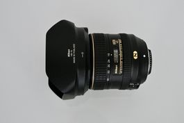 AF-S DX Nikkor 16-80mm f/2.8-4E ED VR – Top Zustand + Filter