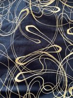 Stoff Baumwolltrikot Schwarz, golden bedruckt