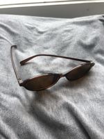 Lunettes de soleil ovales marron