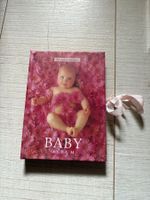 Album photo Anne Geddes pour bébé rose.