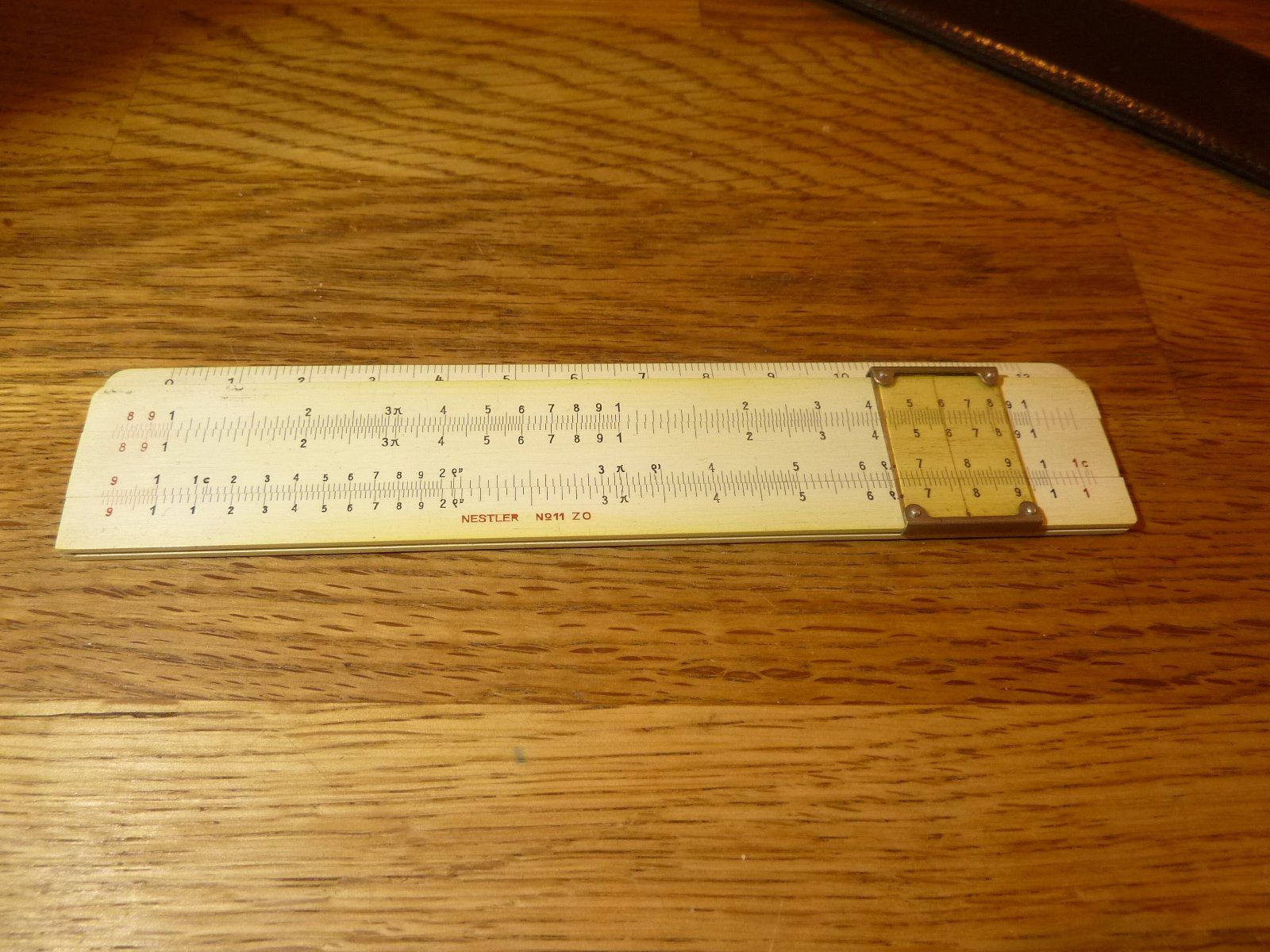 Calcolatrici tascabili: Rechenschieber klein NESTLER No11 15 cm mit Lederetui – Usato da Hochfelden venduto da swissice 4