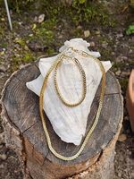 Set goldfarbene Schlangen Halskette und Armband Metall