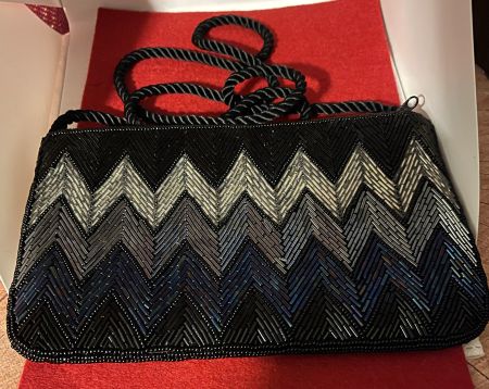 Abendtasche mit Kordel auch zum Umhängen