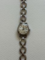 Montre pour femme Tissot bracelet acier état usagé