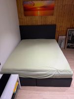 Schwarz-graues Boxspringbett