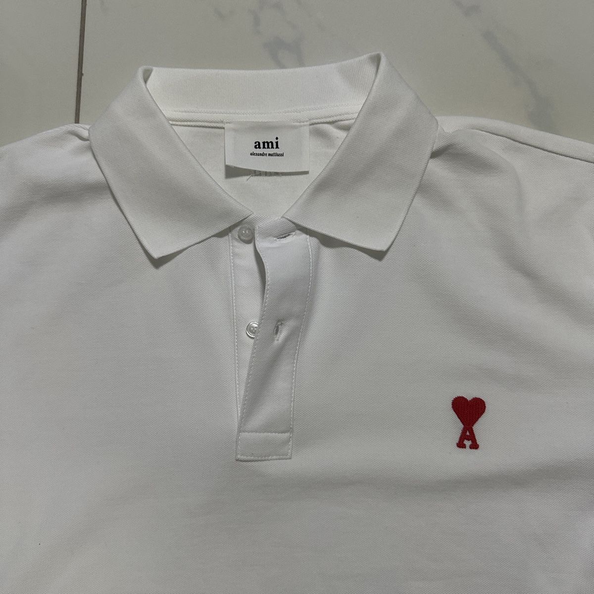 Polo-Shirts: AMI Paris Poloshirt weiss Grösse L – Neu (gemäss Beschreibung) aus Frenkendorf von a_1999 1