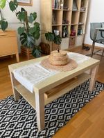 IKEA wooden coffee table with lower shelf