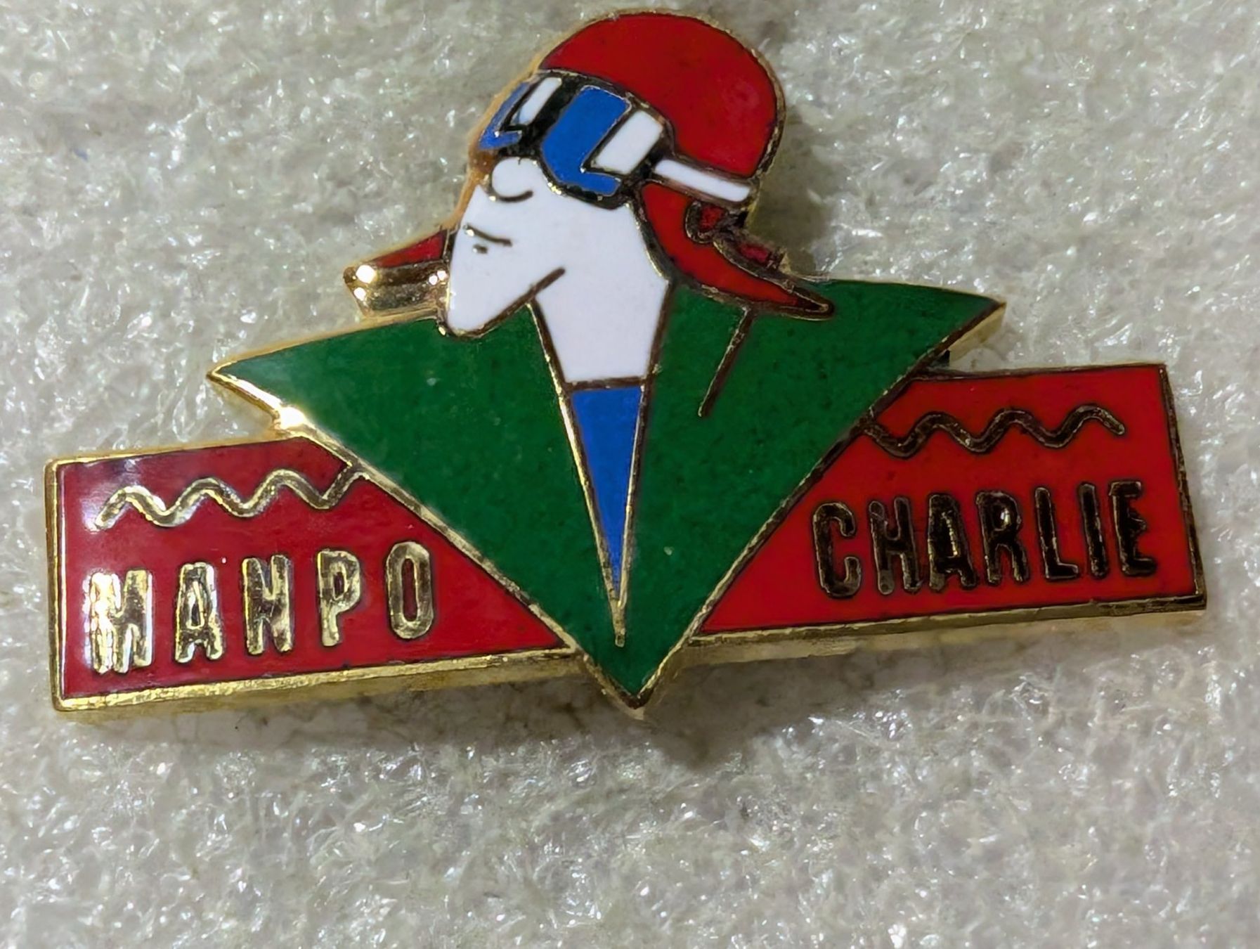 Placchette & Badge: Ansteckpin 116: Manpo Charlie – Usato da Oppligen venduto da Pin-Fall-Shop