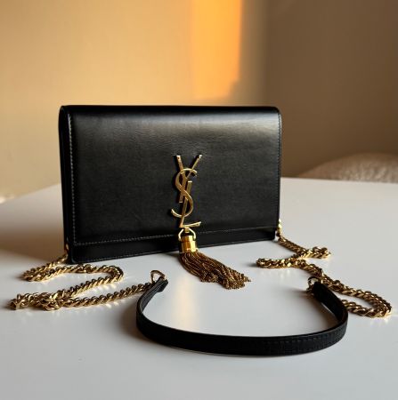 Saint Laurent YSL Kate small Pompom Bag.